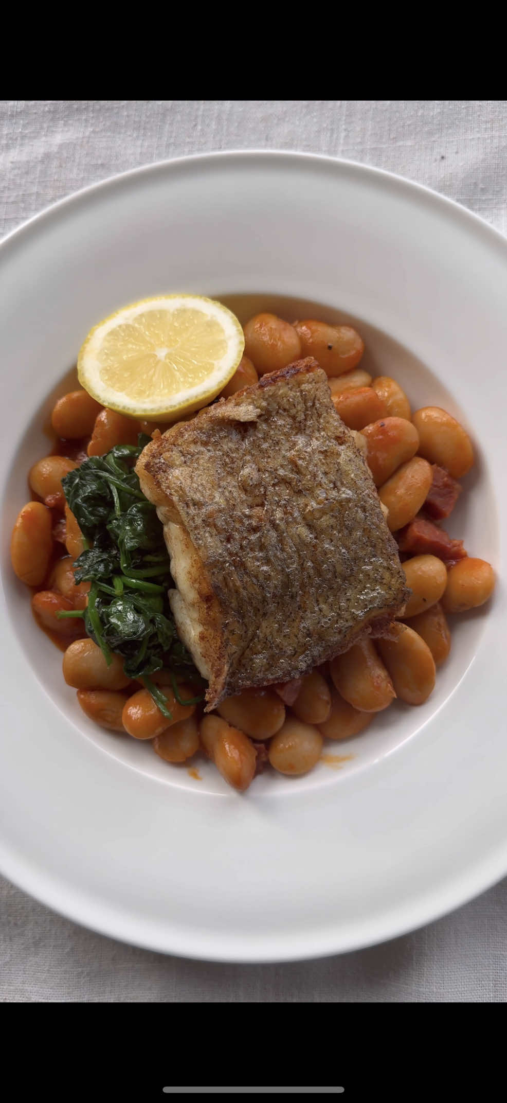 Crispy Skin Hake with Chorizo & Butter Beans by Jack Munn