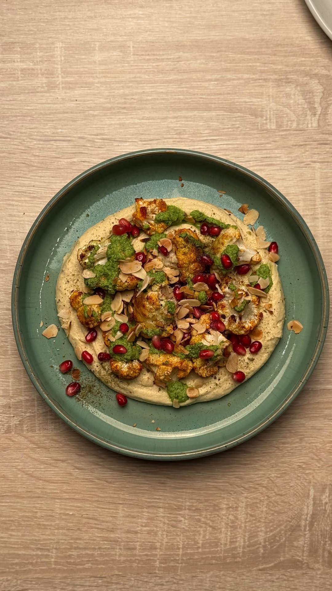 Roasted Cauliflower with Hummus and Mojo Verde by Tanerxaydin